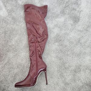 Red latex knee high heels